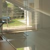 Raumteiler aus Glas in Haus-Galerie